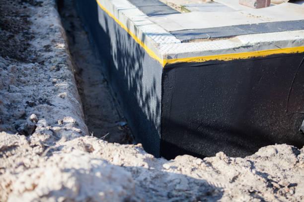 Professional Emergency Waterproofing technician working in Martin, MI